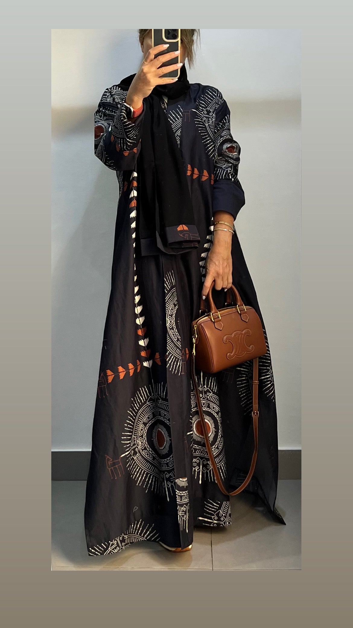 Red India: black abaya dress