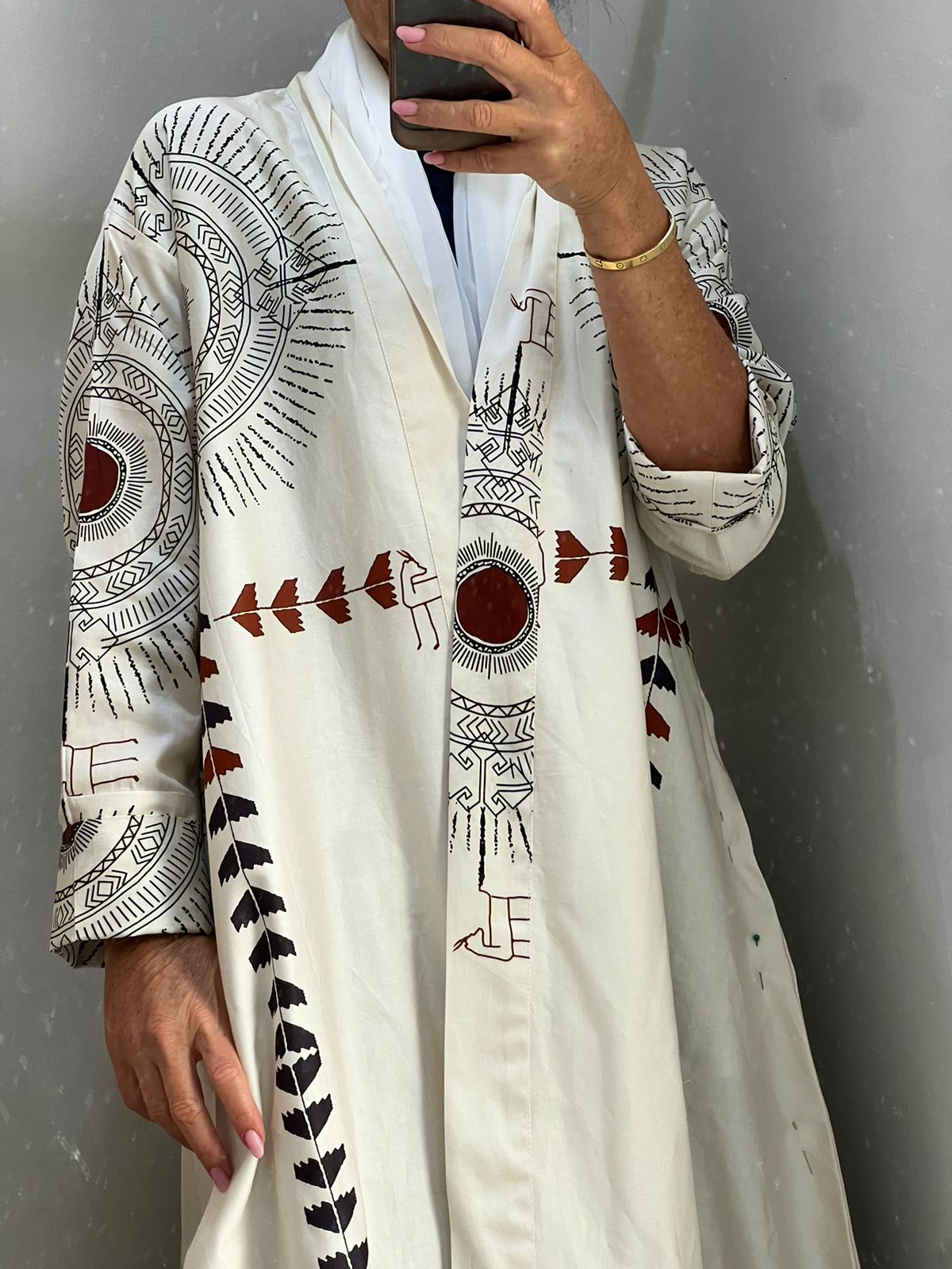 Red India: off-white abaya 