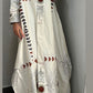 Red India: white abaya 